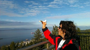 Sherry launching glider from atop Astoria Column in Astoria, OR