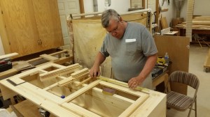 Mike the Master Craftsman creating buffet and table