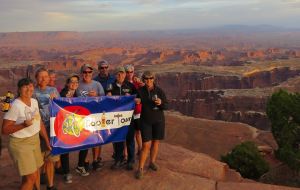 Cooler Tour enjoying sunset at Canyonlands National Park, Utah