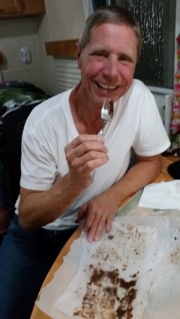 2015-12-03 18.26.37 Bob enjoying Sherrys birthday goodies from Brenna