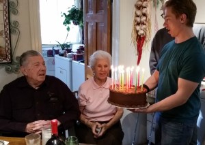 Joe presents Bev's 86th birthday cake.
